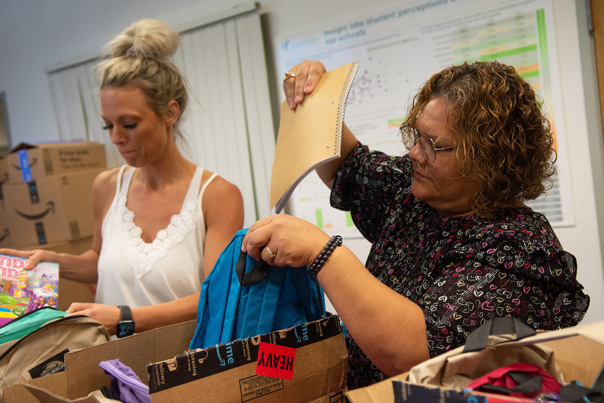  WCSD staff filling backpacks with school supplies